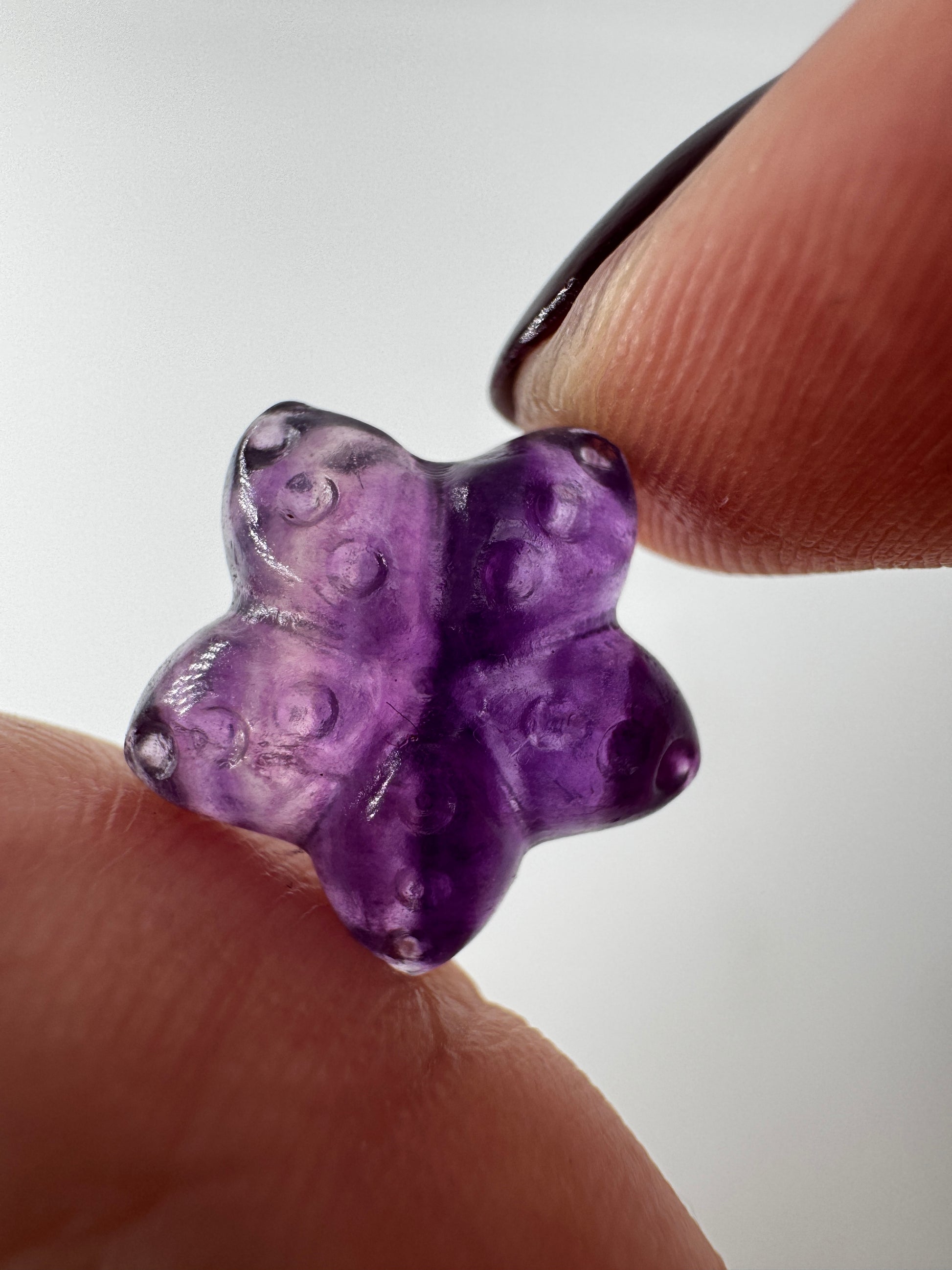 Miniatur-Seestern aus Fluorit FS3 mit glasartigem Glanz, erhältlich in Lila.