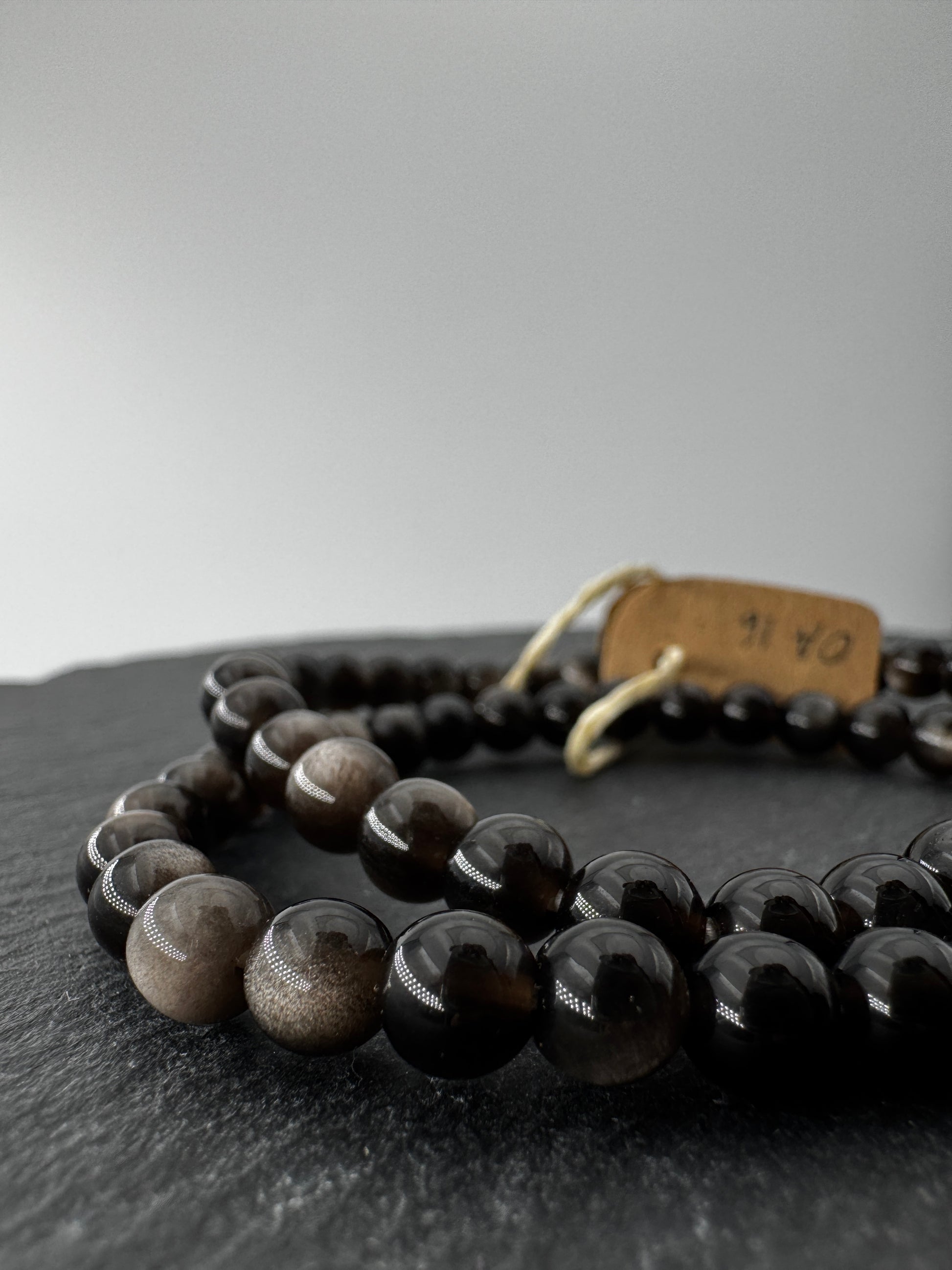 Obsidian Kugelarmband, 6 mm, Umfang 19 cm – vulkanisches Gesteinsglas mit tiefschwarzem, glasartigem Glanz