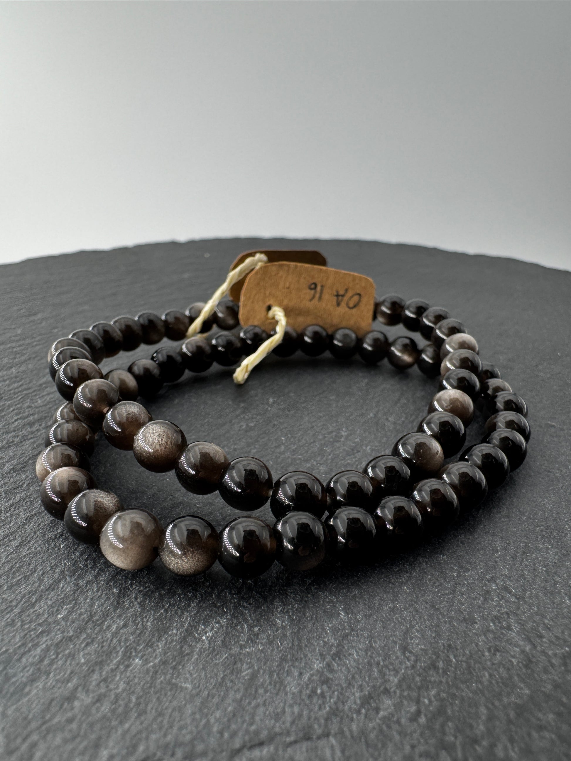 Obsidian Kugelarmband, 6 mm, Umfang 19 cm – vulkanisches Gesteinsglas mit tiefschwarzem, glasartigem Glanz