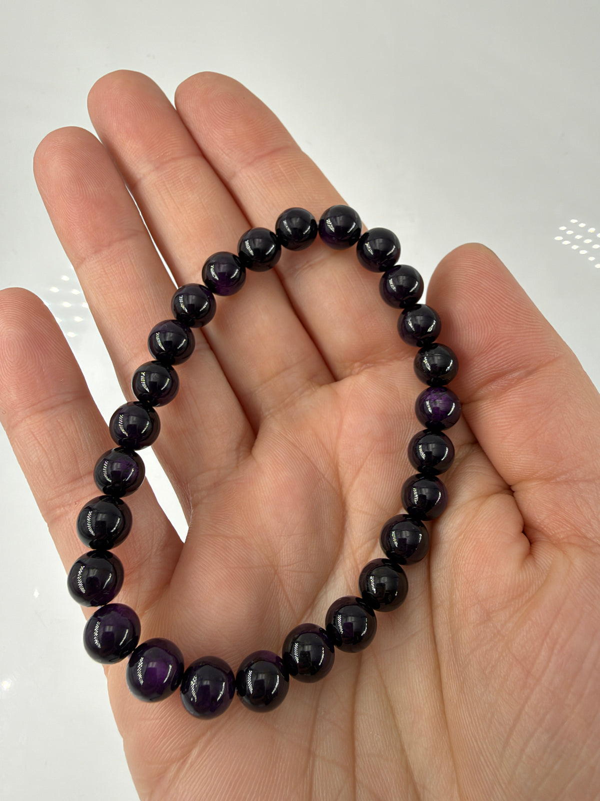 Purpurit-Armbänder PP34 mit glänzenden, dunkelvioletten Kugelperlen