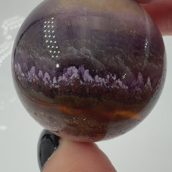 Fluoritkugel mit Garteneinschlüssen und Pyrit, Durchmesser 3,6 cm